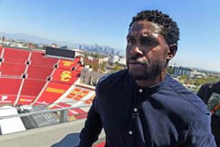 Los Angeles, California August 23, 2023-Former USC running back Reggie Bush leaves a press conference.