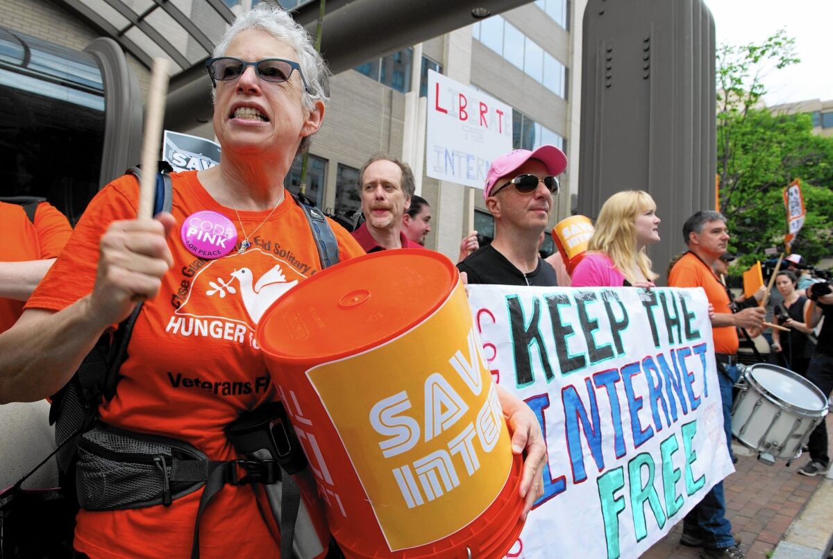 Demonstrators in May hold a rally in support of so-called net neutrality outside the offices of the Federal Communications Commission in Washington.