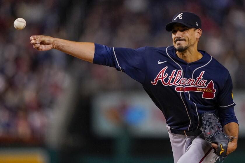 Atlanta Braves starting pitcher Charlie Morton throws during the first inning of a baseball game against the Washington Nationals at Nationals Park, Friday, Sept. 22, 2023, in Washington. (AP Photo/Andrew Harnik)