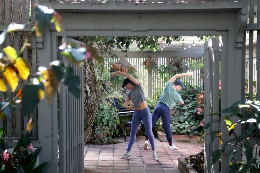 Amie Lee Kilgore, left, and Samuel DeAngelo rehearse for a dance exhibition coming to Sherman Library & Gardens on Oct. 16.