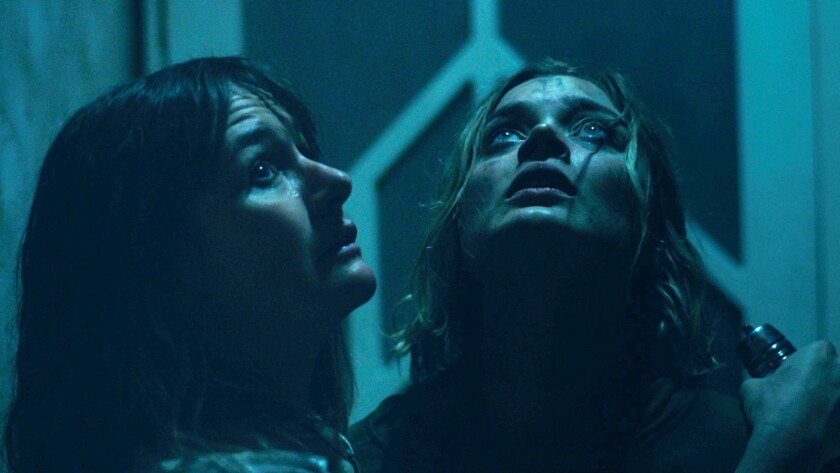 Emily Mortimer and Bella Heathcote in a scene from "Relic." 