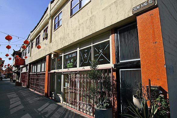 Ali Jeevanjee and Poonam Sharma, the husband-and-wife principals of LOC Architects, bought two second-story apartments in Los Angeles' Chinatown with the intent of creating a livable, light-filled, live-work space. It was a challenge: The one-bedroom units were dark and cramped, with low ceilings and an enclosed kitchen. Plus the couple had to resist making any architectural changes to the exterior that would have affected the historic charm of the street.