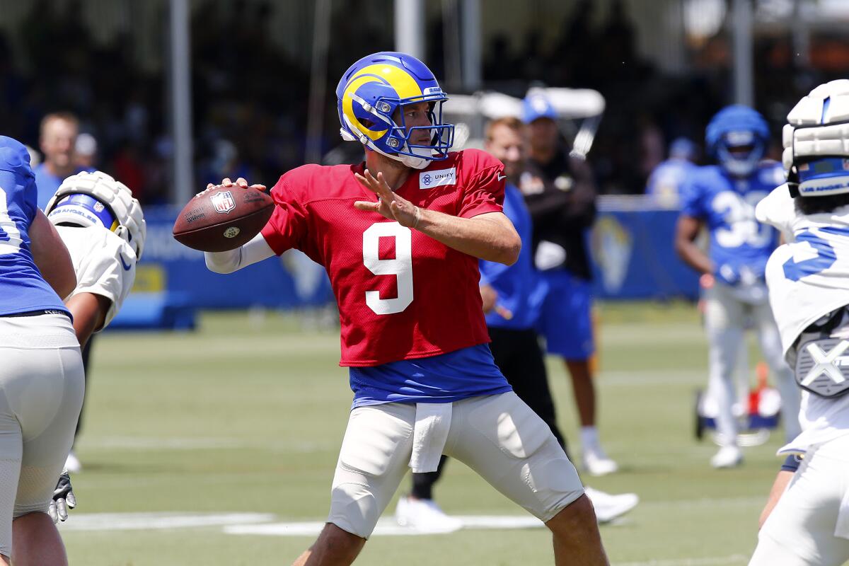 Quarterback Matthew Stafford (9) throws the ball in a scrimmage during open practice at UC Irvine on Friday.