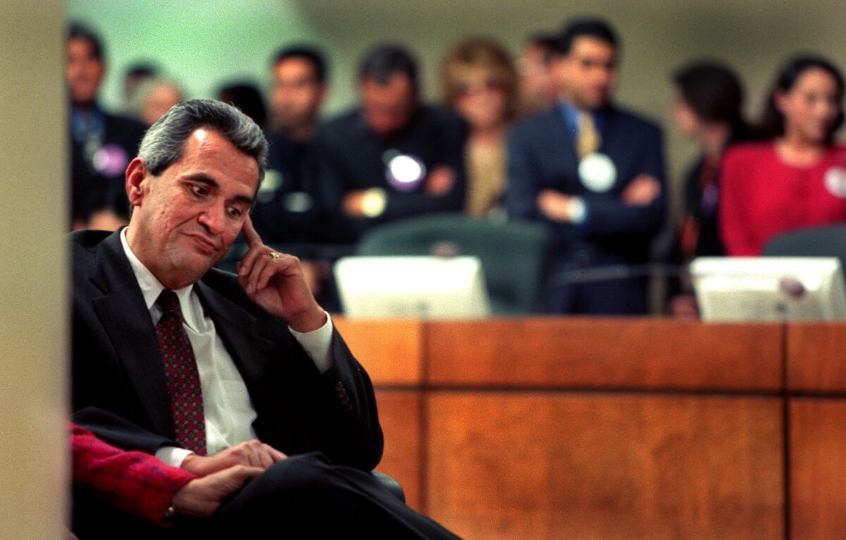 Then-L.A. City Councilman Richard Alatorre at a news conference announcing his retirement in 1999.