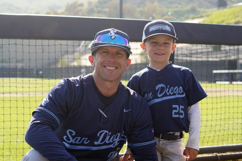USD coach Brock Ungricht had 5-year-old son Ben assist with some on-field duties this season.