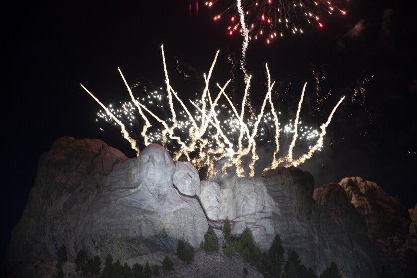 FILE - In this July 3, 2020, file photo, fireworks light the sky over the Mount Rushmore National Memorial near Keystone, S.D. South Dakota Gov. Kristi Noem indicated Tuesday, June 15, 2021, that she will try again to hold a fireworks display over Mount Rushmore to celebrate Independence Day on the heels of President Joe Biden's announcement that the White House will be hosting its own "independence from the virus" bash.. (AP Photo/Alex Brandon File)
