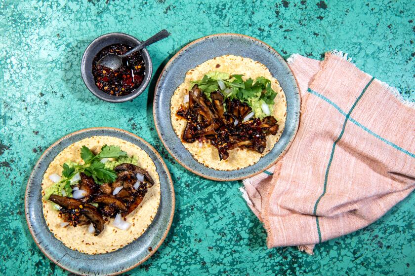 You can make these tacos with sliced button mushrooms, left, or maitakes.