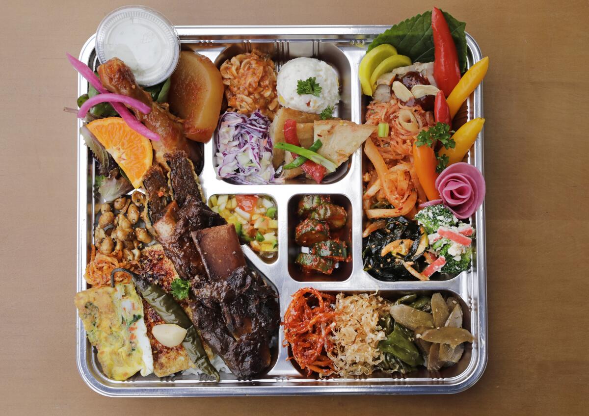The dosirak from Spoon by H, a special to-go tray of two dozen small dishes.