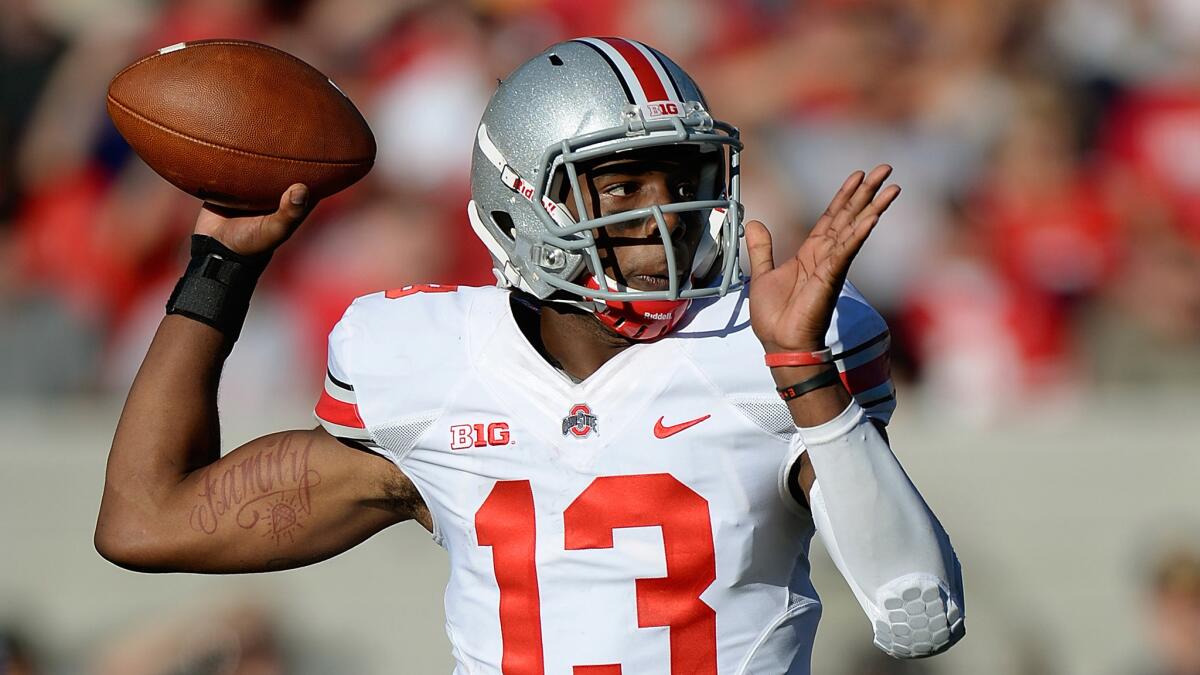 Ohio State quarterback Kenny Guiton throws a pass during a game against California in September. Guiton's speed and athleticism make him a welcomed addition to the KISS roster.