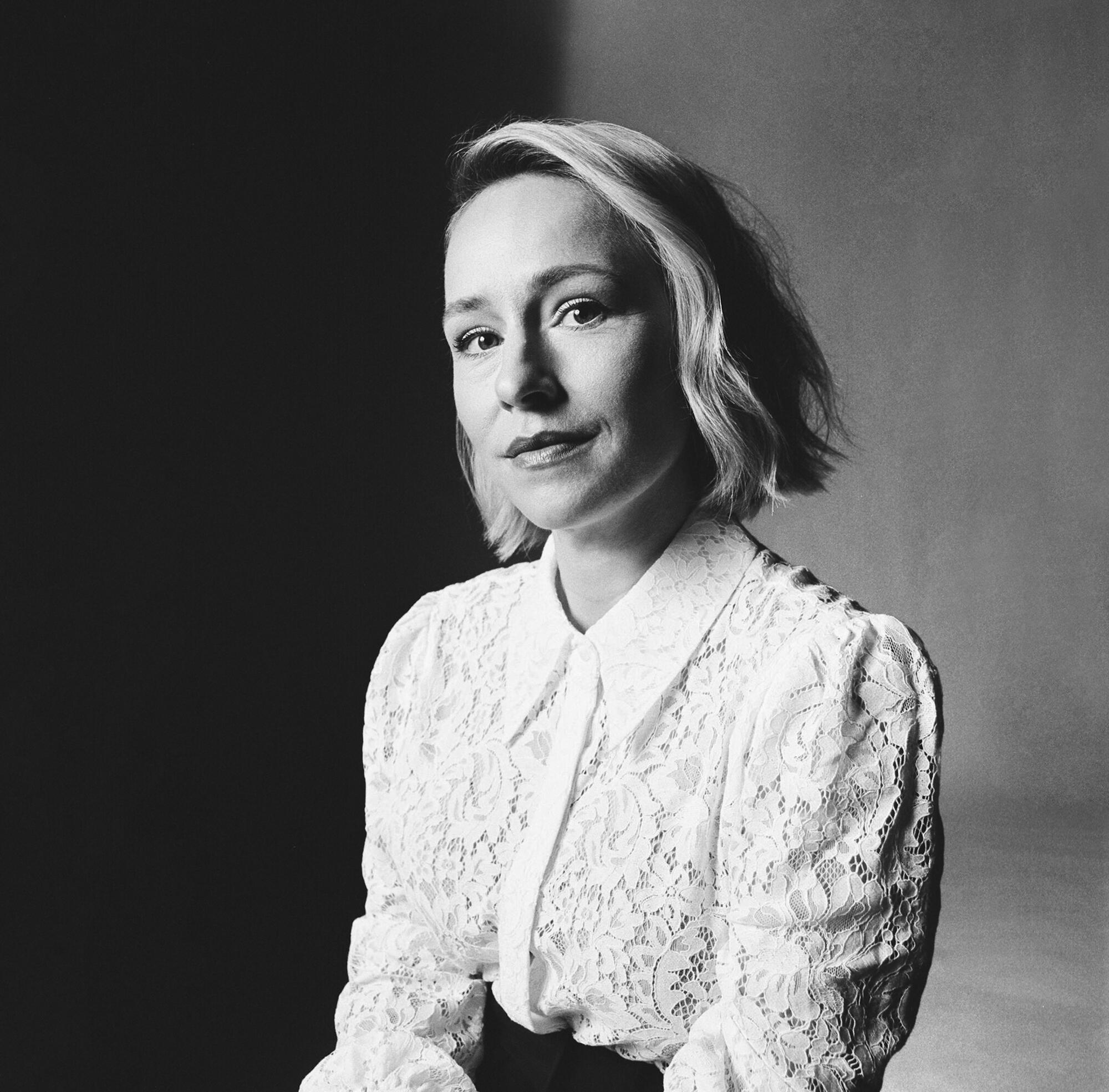 A black-and-white portrait of Sarah Goldberg