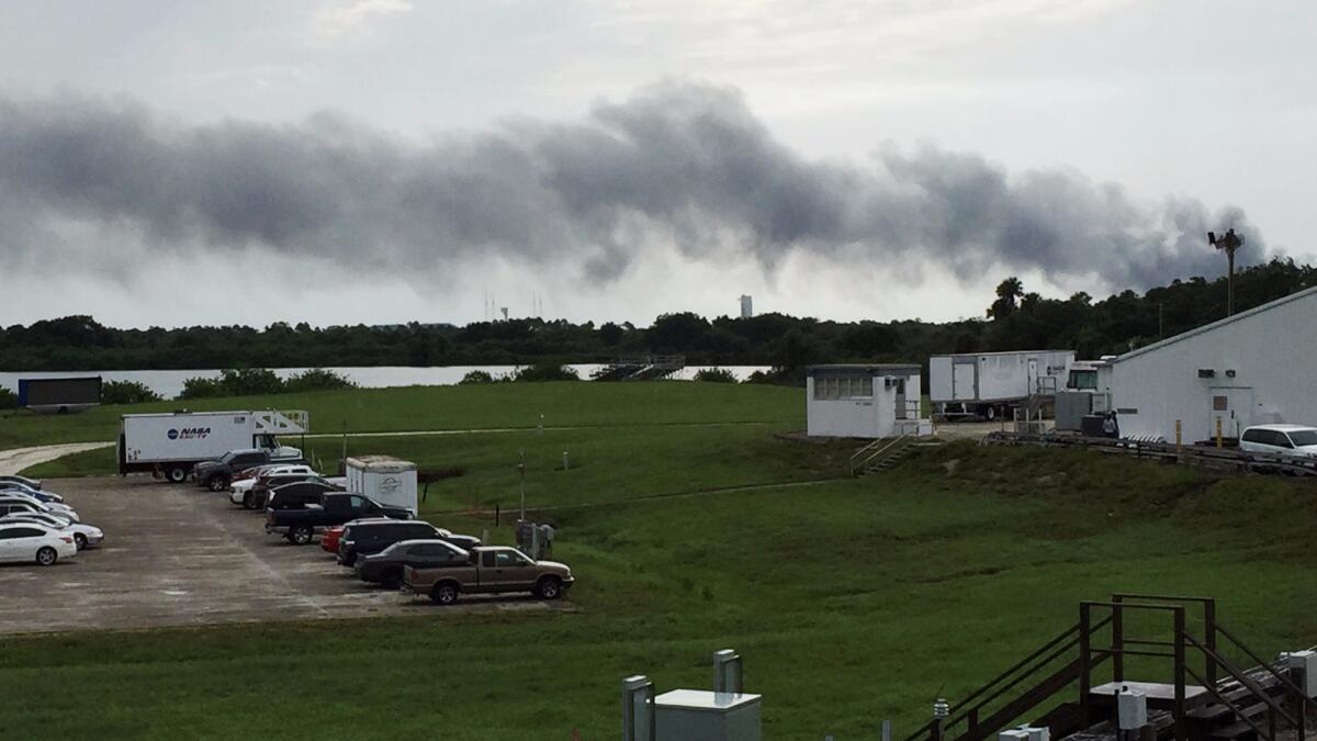 Smoke rises from a SpaceX launch site Thursday at Cape Canaveral, Fla.