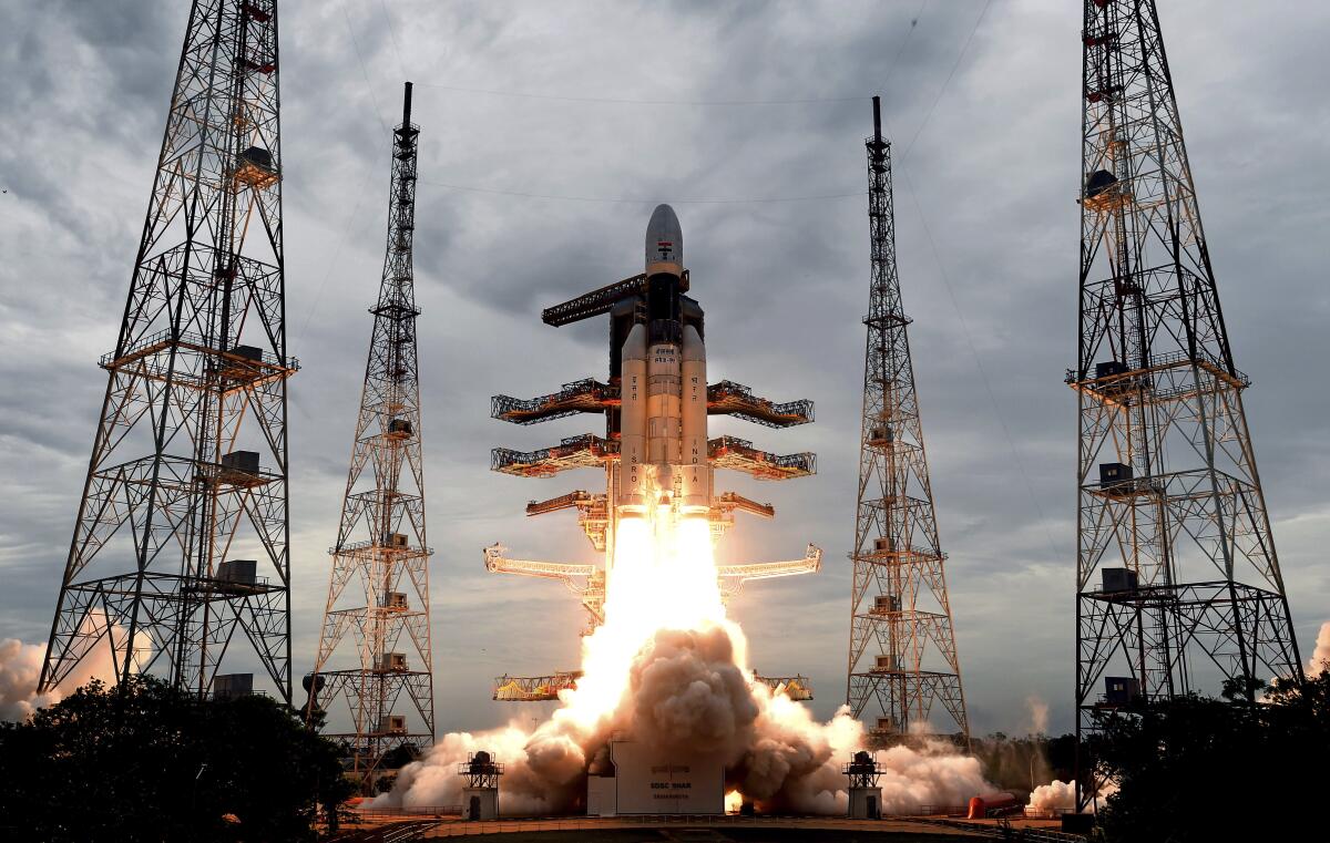 A rocket carrying the Chandrayaan spacecraft lifts off from Satish Dhawan Space center in Sriharikota, India, on Monday.