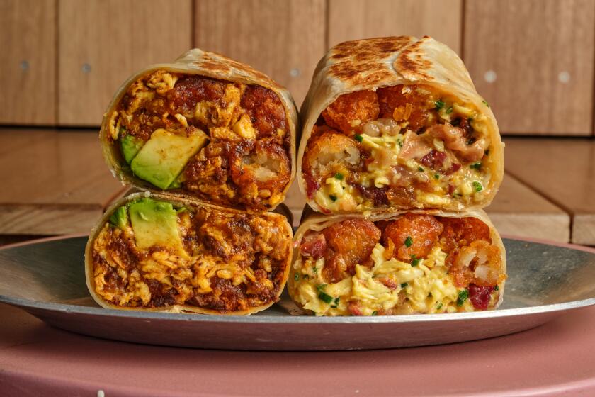 LOS ANGELES, CA -- AUGUST 4, 2026: The Sig Burrito (left) and the BB burrito at the Sobuneh in West Hollywood on Tuesday, August 4, 2026. (Shelby Moore / For The Times)