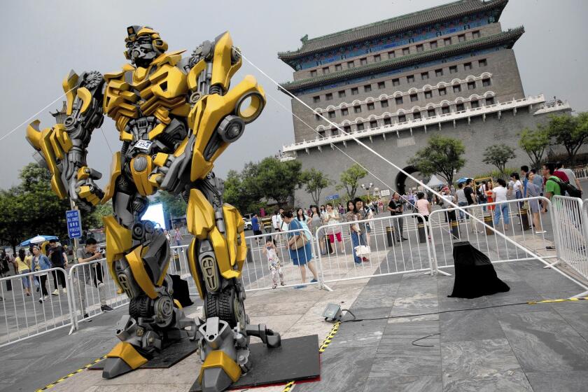 A model of "Transformers" character Bumblebee is displayed in Beijing as part of a promotion of the movie "Transformers: Age of Extinction."