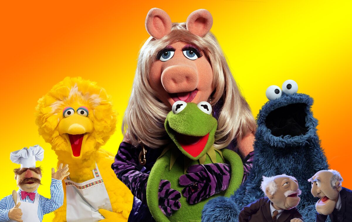 Muppet characters Swedish Chef, Big Bird, Miss Piggy and Kermit, Cookie Monster and Statler and Waldorf.