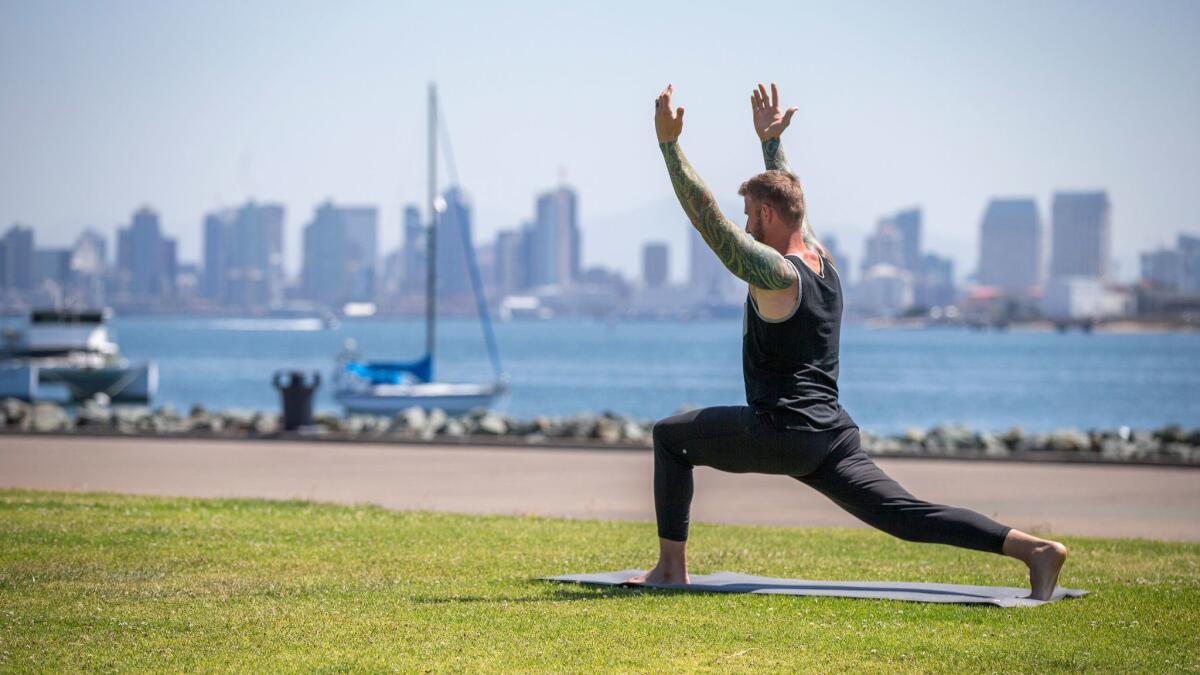 Yoga, against a scenic San Diego backdrop.