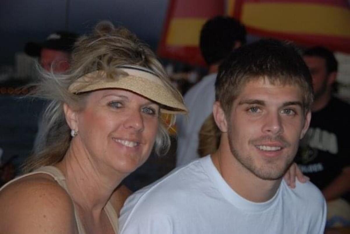 Colt Brennan and his mother, Betsy, after a Hawaii game.