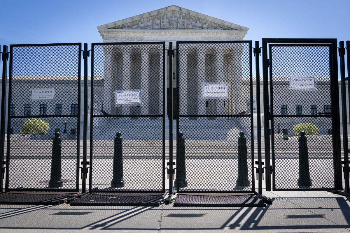 Anti-scaling fencing blocks off the steps to the Supreme Court.