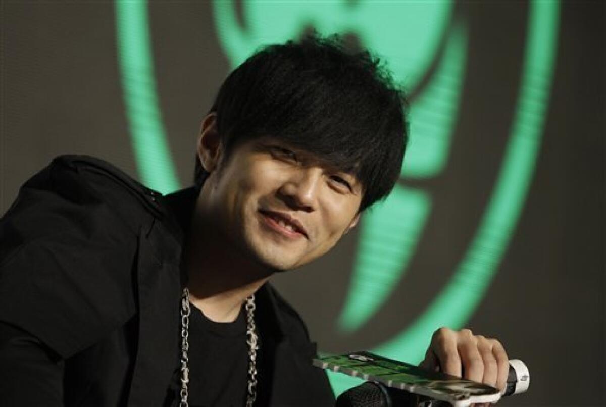 Taiwanese singer/actor Jay Chou attends a media conference a day before the opening of his new film "The Green Hornet" in Taipei, Taiwan, Thursday, Jan. 27, 2011. (AP Photo/Wally Santana)