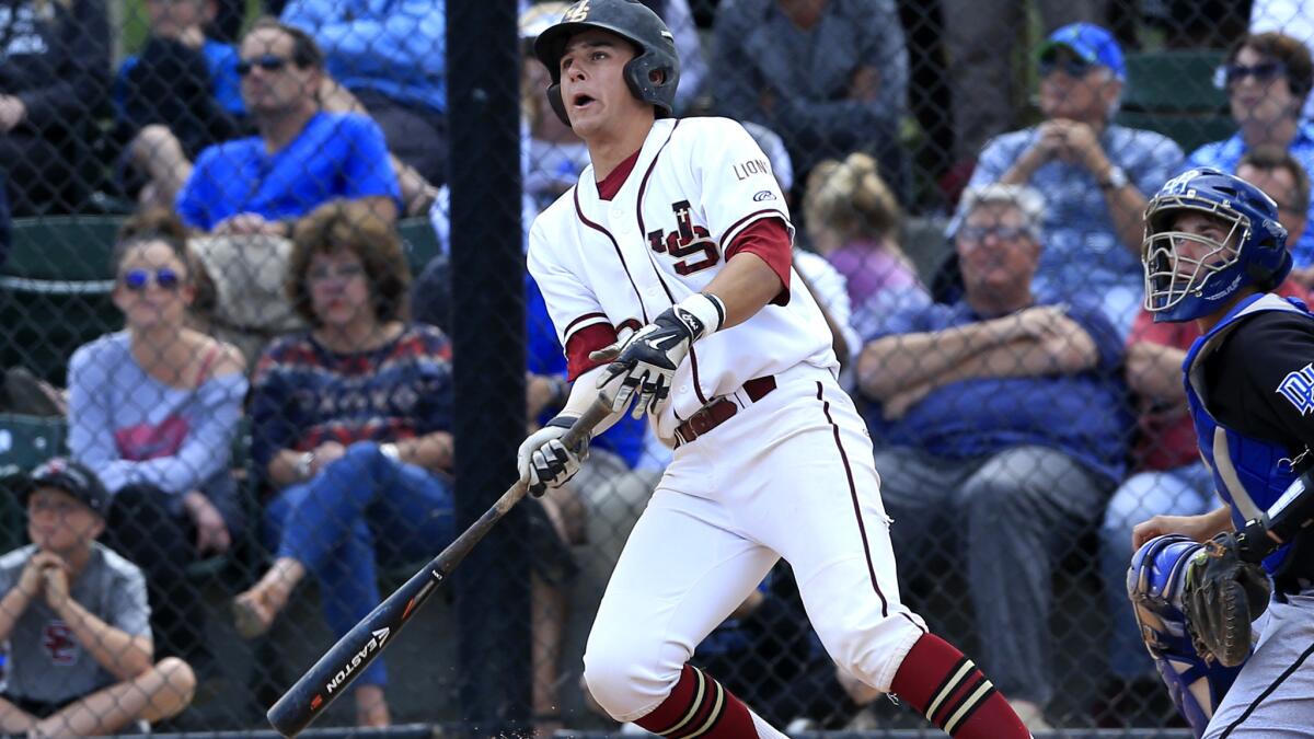JSerra's Chase Strumpf watches his three-run home run soar toward the left-field fence during the third inning of a 3-0 victory over Dana Hills on Friday.