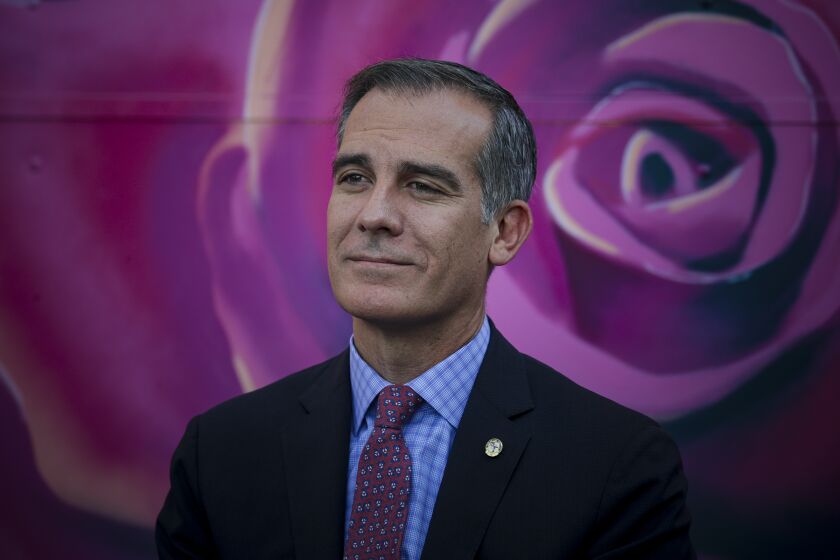 Los Angeles, CA - October 21: Los Angeles Mayor Eric Garcetti at the opening of Arroyo Seco Tiny Home Village, nation's largest community of tiny homes villages, featuring 117 cabins with 224 non-congregate beds that provide transitional housing to local people experiencing homelessness in Highland Park on Thursday, Oct. 21, 2021 in Los Angeles, CA. (Irfan Khan / Los Angeles Times)