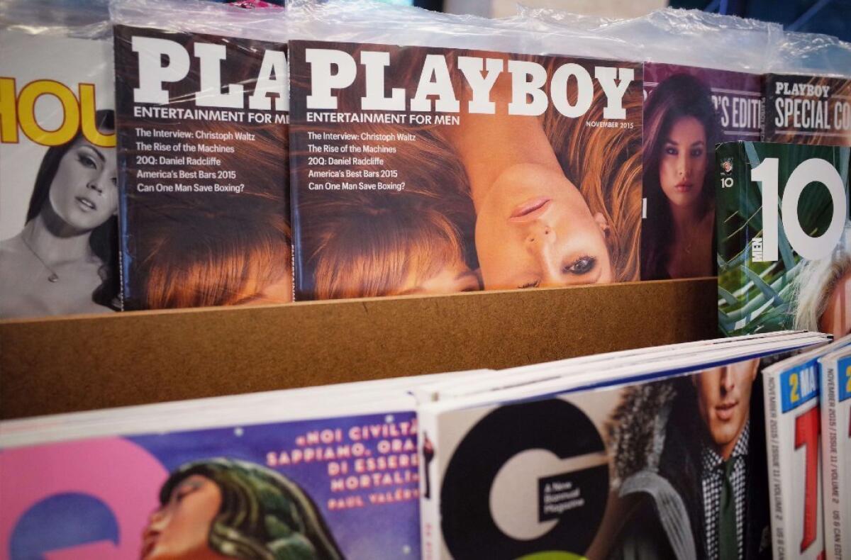 November 2015 issues of Playboy magazine are seen on the shelf of a bookstore in Bethesda, Maryland on October 13, 2015. Playboy said last year it would stop publishing nude photos in its iconic magazine.