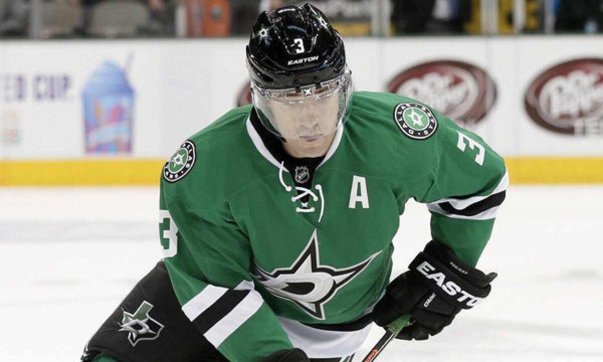 Dallas Stars defenseman Stephane Robidas controls the puck during a game against the Calgary Flames in October. The Ducks acquired the veteran blueliner Tuesday.