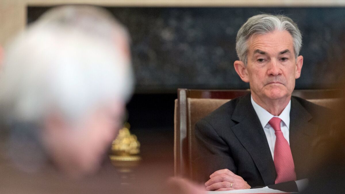 Federal Reserve Gov. Jerome Powell attends a Board of Governors meeting in 2015.