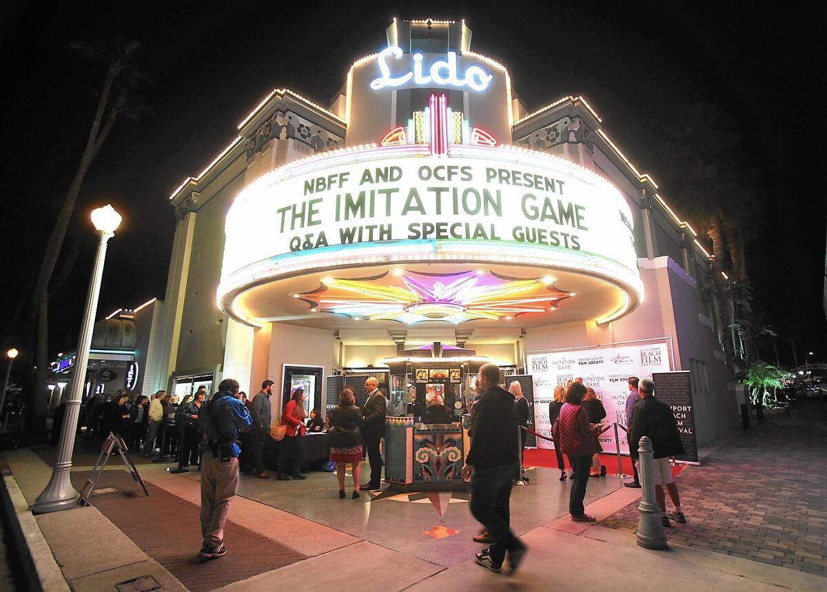 The Lido Theater marquee announces a screening of "The Imitation Game" in 2015. After a brief stint as a music venue, the 1930s-era theater is expected to soon return to its roots as a movie house.