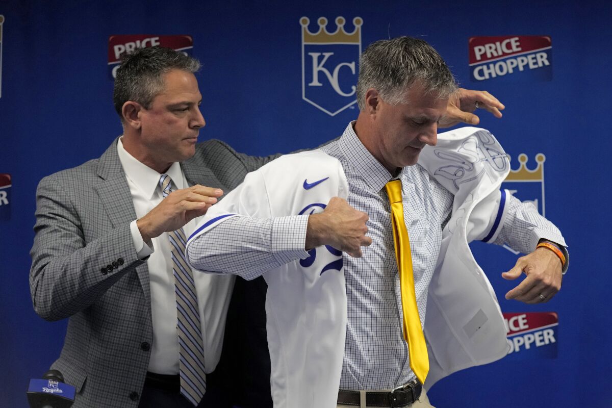 Matt Quatraro is helped by general manager J.J. Piccolo