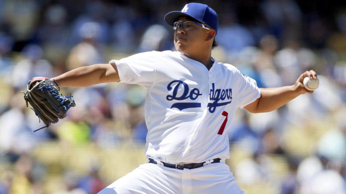 Dodgers rookie Julio Urias picked up the victory in relief against the Pittsburgh Pirates on Saturday.