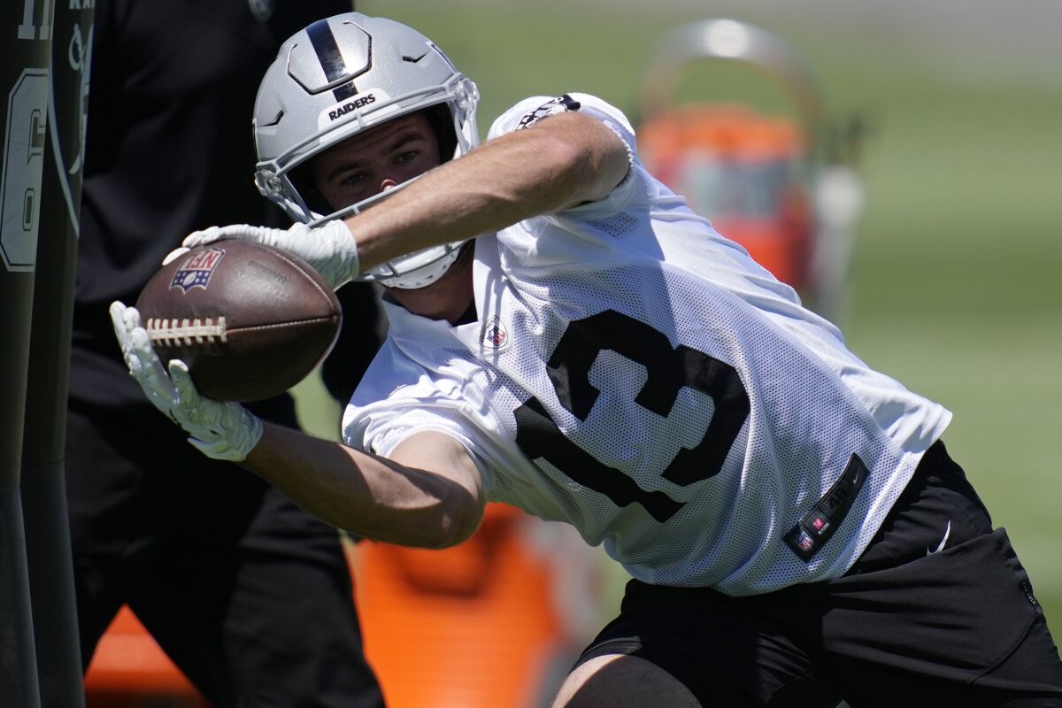 Las Vegas Raiders wide receiver Hunter Renfrow catches a pass during practice June 2 in Henderson, Nev.