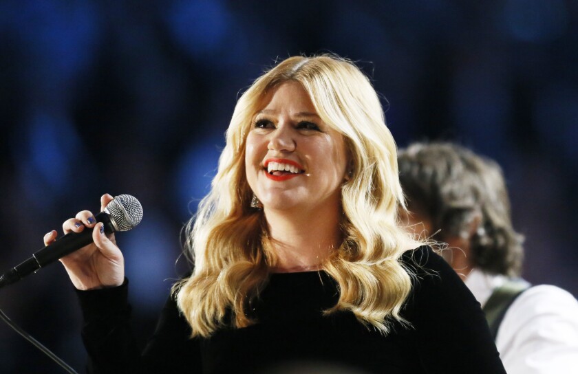 Kelly Clarkson performs at the 55th annual Grammy Awards at Staples Center.