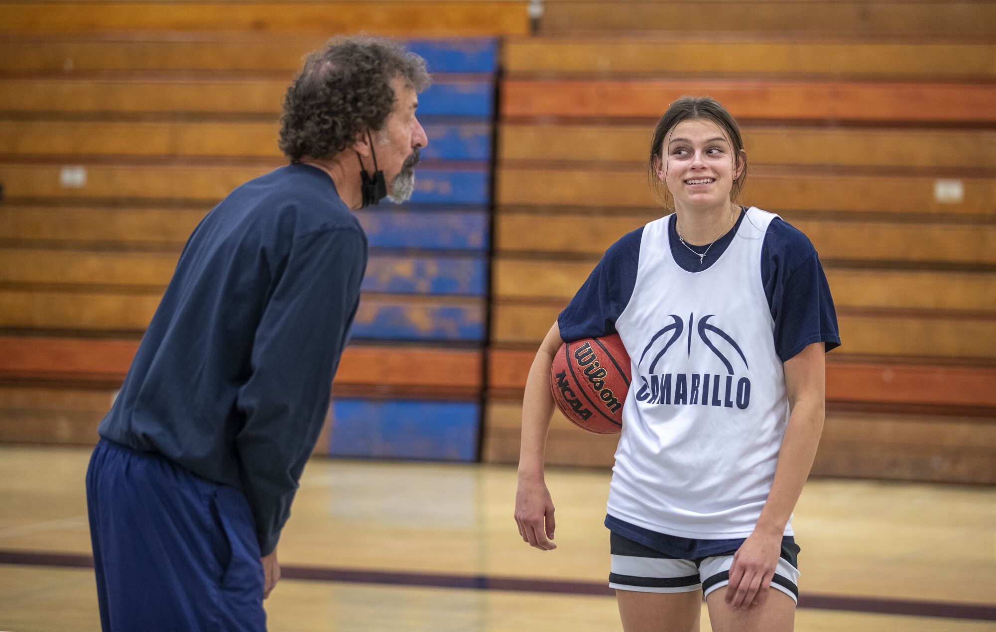 Camarillo coach Mike Prewitt and Gabriela Jaquez chat during a practice.