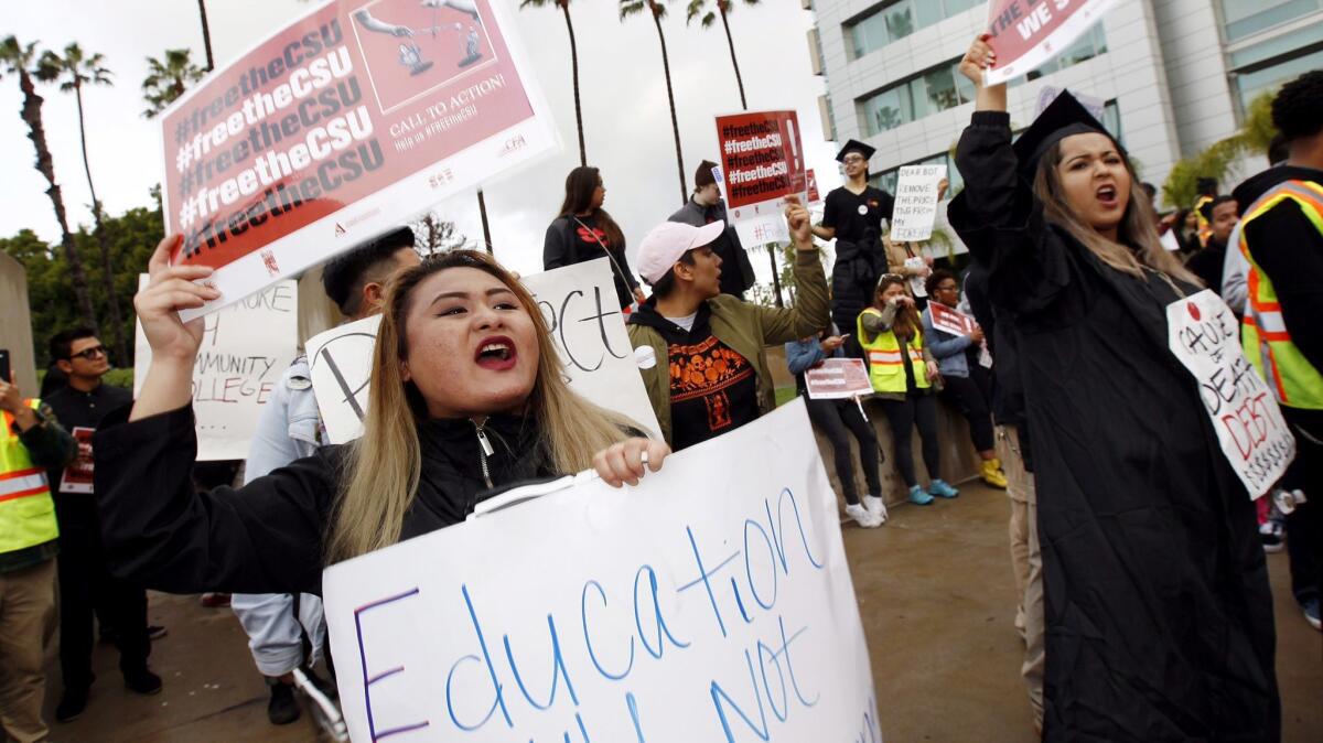 Students from across the system’s 23 campuses protest outside a Cal State trustees board meeting in March.