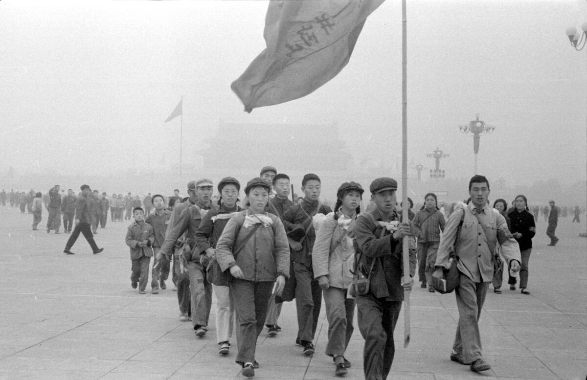 Red Guards devoted to Mao Zedong marching in Tiananmen Square in 1966