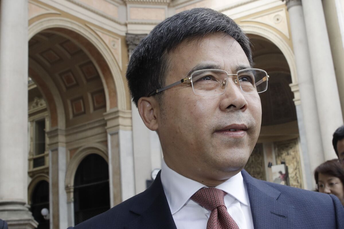 FILE - The then-Bank of China chairman, Liu Liange, arrives on the occasion of the Italy-China Financial forum, at Palazzo Marino town hall, in Milan, Italy, on July 10, 2019. The former chairman of Bank of China Ltd., one of the country's four major state-owned lenders, is under investigation by the ruling Communist Party's anti-corruption agency, state TV reported Friday, March 31, 2023, adding to a string of high-level financial figures ensnared in a marathon crackdown. (AP Photo/Luca Bruno, File)