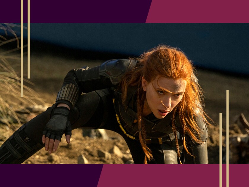 Scarlett Johansson crouches in a scene from “Black Widow.”