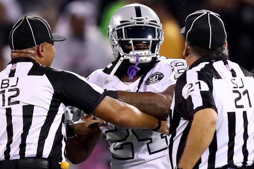 OAKLAND, CA - OCTOBER 19: Marshawn Lynch #24 of the Oakland Raiders is restrained after coming off the bench and shoving a referee during a scrum with the Kansas City Chiefs in their NFL game at Oakland-Alameda County Coliseum on October 19, 2017 in Oakland, California. Lynch was ejected for unsportsmanlike conduct. (Photo by Ezra Shaw/Getty Images) ** OUTS - ELSENT, FPG, CM - OUTS * NM, PH, VA if sourced by CT, LA or MoD **