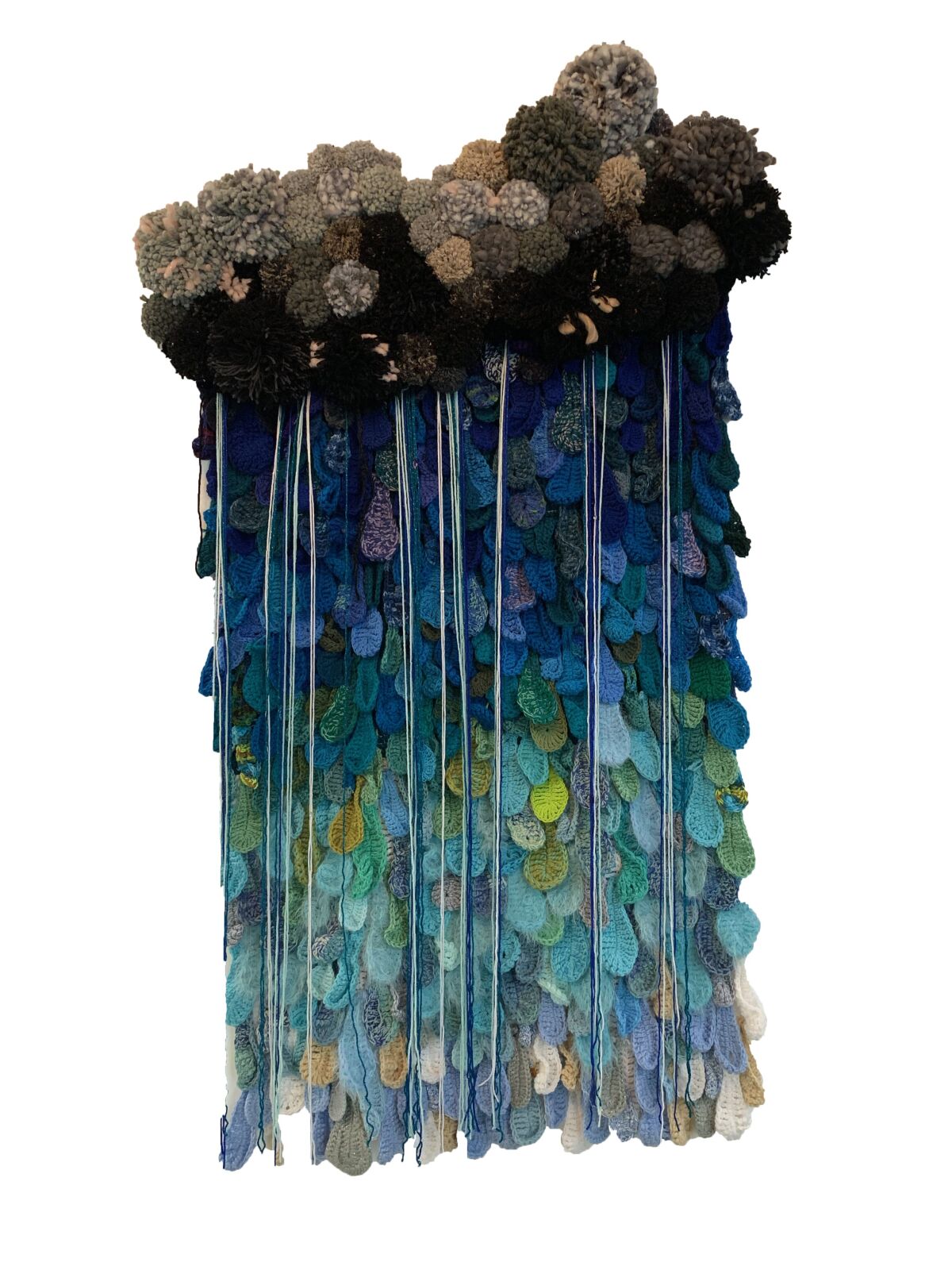 “Drips,” on display at Irvine’s WorkWell, is another piece made with recycled tears from their “Weeping Willow” project. It was inspired by Liz Flynn’s desire to create a blanket about “the feels.”