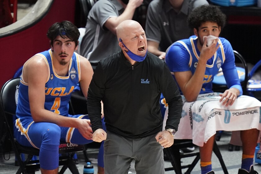 UCLA coach Mick Cronin shouts to the team during the first half of an NCAA college basketball game.