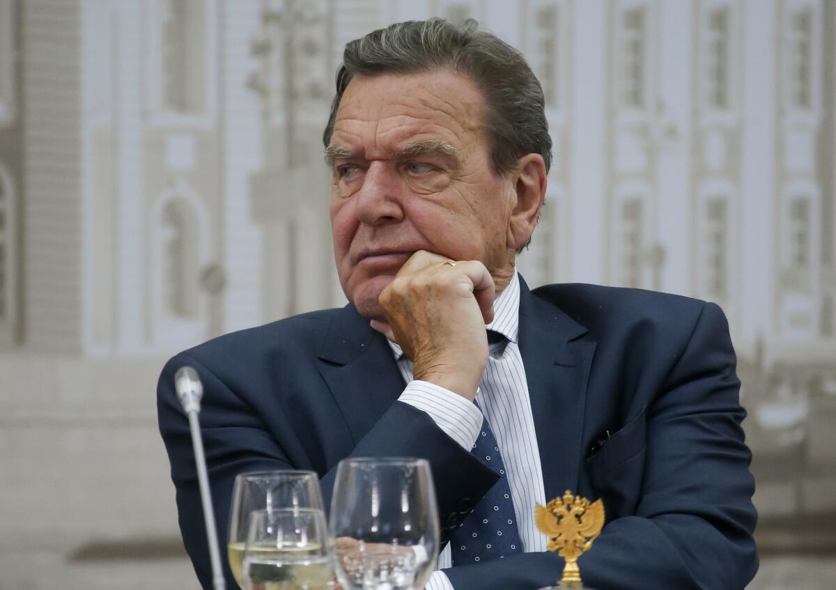 FILE - Former German Chancellor Gerhard Schroeder attends a meeting of Russian President Vladimir Putin with chief executives of international companies at the St. Petersburg International Economic Forum in St. Petersburg, Russia, Friday, June 17, 2016. Local officials with German Chancellor Olaf Scholz’s party have met to consider calls to expel former Chancellor Gerhard Schroeder. The ex-leader's longstanding ties to the Russian energy sector and refusal to distance himself fully from President Vladimir Putin after Russia invaded Ukraine have left his political standing in tatters. (AP Photo/Dmitry Lovetsky, File)