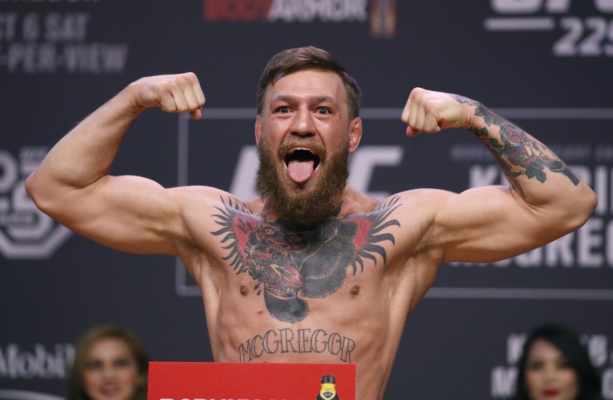 Conor McGregor poses during a ceremonial weigh-in for the UFC 229 mixed martial arts fight in Las Vegas. Superstar UFC fighter McGregor has announced on social media that he is retiring from mixed martial arts. McGregor’s verified Twitter account had a post early Tuesday, March 26, 2019, that said the former featherweight and lightweight UFC champion was making a “quick announcement.”