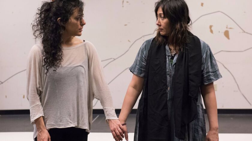 Nadine Malouf and Kate Rigg rehearse for the world premiere of the theatrical adaptation of Khaled Hosseini's novel "A Thousand Splendid Suns" at an American Conservatory Theater studio in San Francisco.
