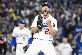 Los Angeles, CA - April 18: Los Angeles Dodgers starting pitcher Clayton Kershaw reacts after striking out New York Mets' Tommy Pham to end the seventh inning at Dodger Stadium on Tuesday April 18, 2023 in Los Angeles, CA.(Wally Skalij / Los Angeles Times)