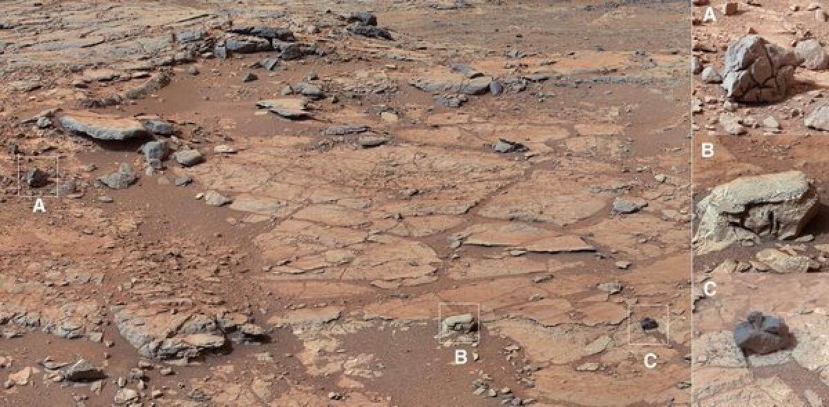 This image released by NASA shows the view of Curiosity's planned first drilling site, known as John Klein, in an area called Yellowknife Bay.