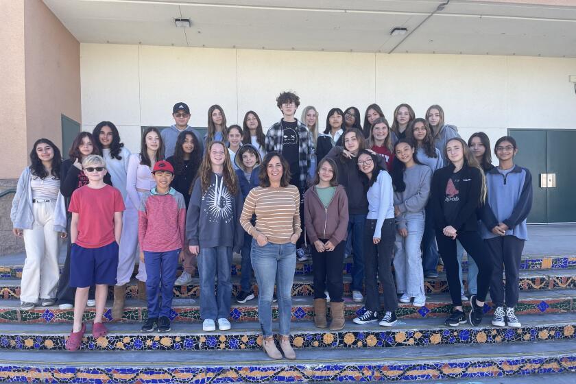 Carmel Valley Middle School yearbook staff/students and adviser.