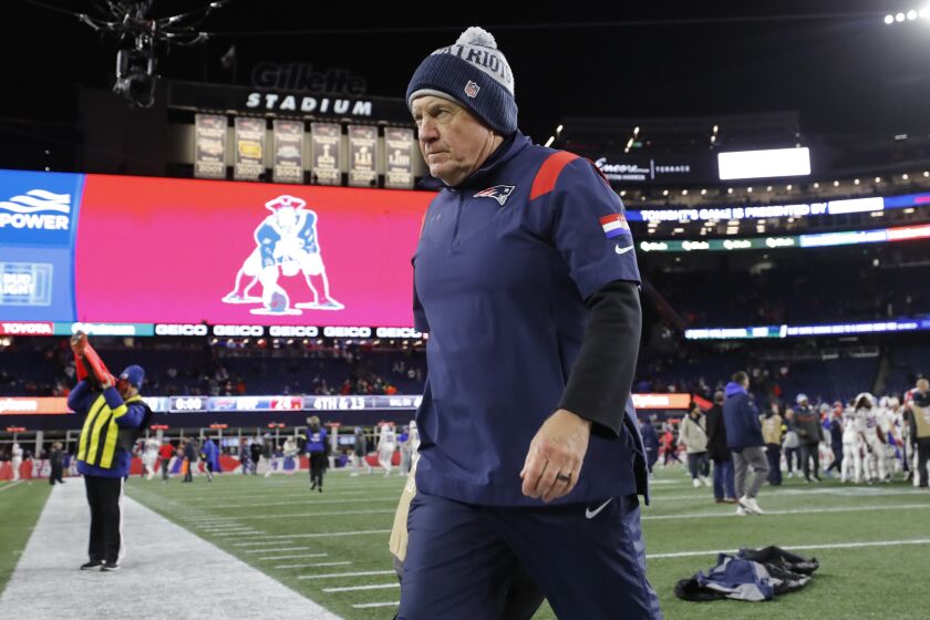 New England Patriots head coach Bill Belichick walks off the field after the team's 24-10 loss to the Buffalo Bills in an NFL football game Thursday, Dec. 1, 2022, in Foxborough, Mass. (AP Photo/Michael Dwyer)