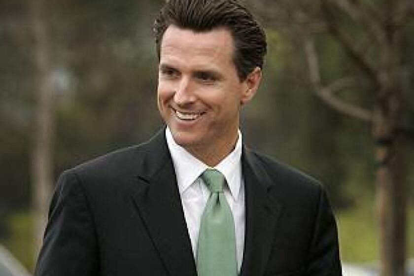 San Francisco Mayor Gavin Newsom wore a green tie Wednesday when he visited San Diego, touting his green credentials.