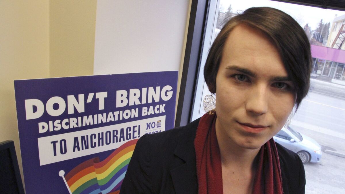Lillian Lennon poses for a portrait in Anchorage in April 2018. Lennon, a transgender teenager, was a field organizer who helped defeat a bathroom bill before Anchorage voters.